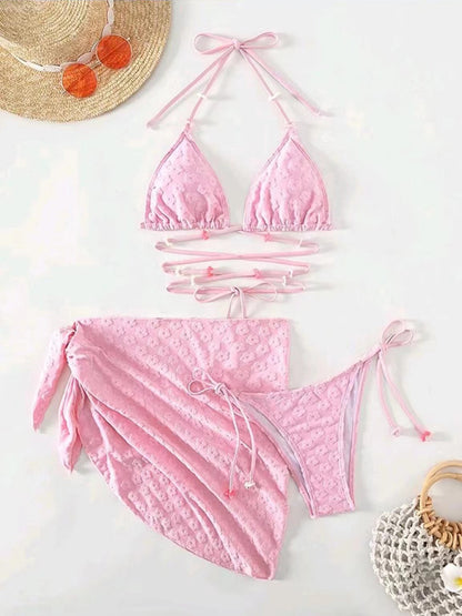 Feminine and cute three-piece bikini with floral lace pattern