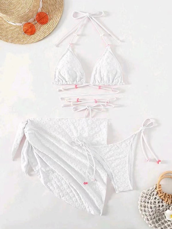 Feminine and cute three-piece bikini with floral lace pattern