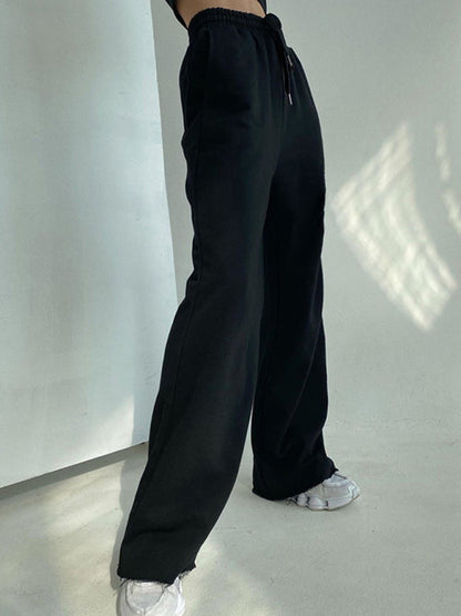 Women's solid color sports style casual loose tie wide leg pants
