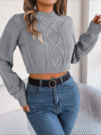 New autumn and winter casual solid color twist long-sleeved pullover navel-baring sweater