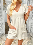 Bohemian casual solid color sexy hollow short-sleeved jumpsuit